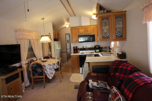 kitchen with kitchen peninsula, light carpet, white appliances, pendant lighting, and lofted ceiling