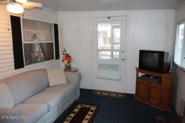 living room featuring ceiling fan