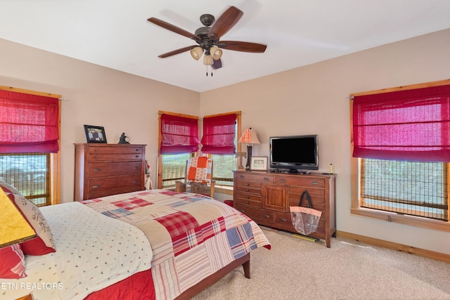 bedroom featuring ceiling fan and carpet flooring