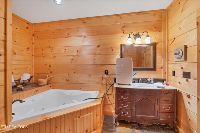 bathroom with wood walls, tile floors, and vanity