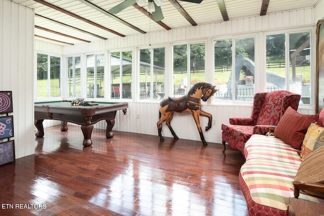 sunroom / solarium featuring wood ceiling, beamed ceiling, pool table, and ceiling fan