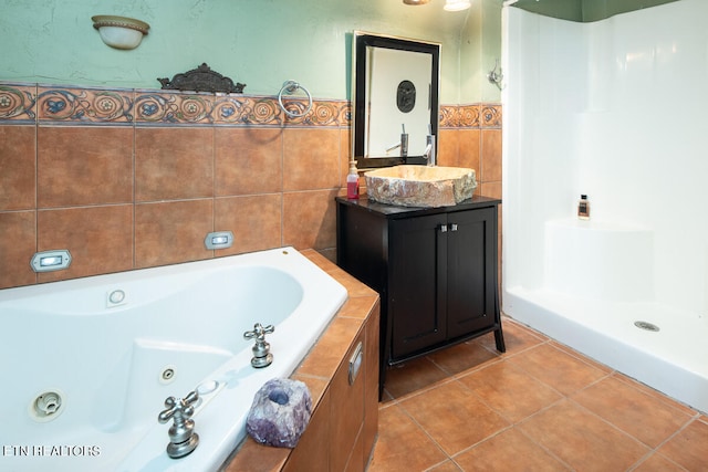 bathroom featuring vanity, tile floors, and tile walls