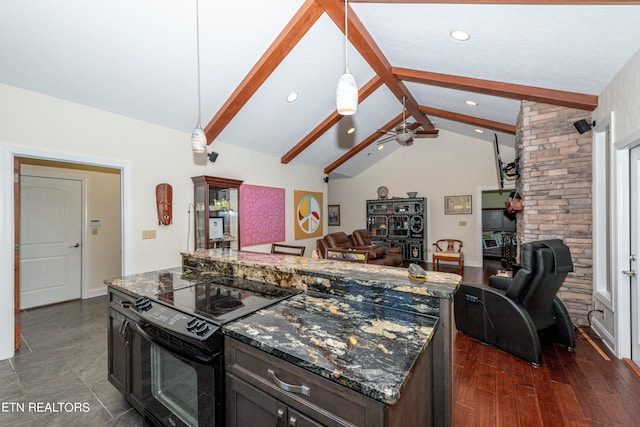 kitchen featuring vaulted ceiling with beams, pendant lighting, electric range, and dark stone counters