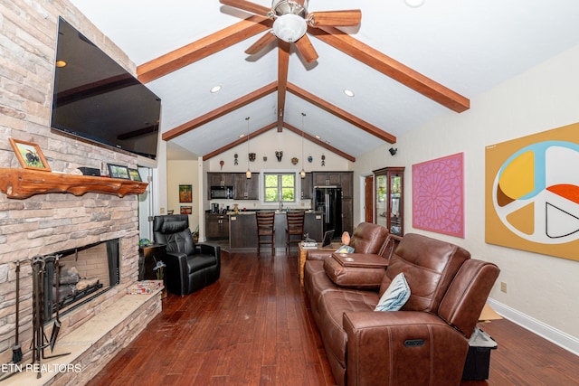 living room with high vaulted ceiling, beamed ceiling, a fireplace, hardwood / wood-style flooring, and ceiling fan