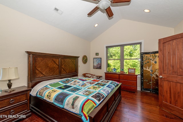 bedroom with lofted ceiling, ceiling fan, and dark hardwood / wood-style floors