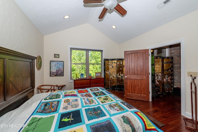 bedroom featuring dark hardwood / wood-style floors, lofted ceiling, and ceiling fan