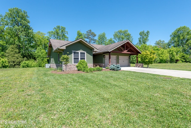 craftsman-style home with a front lawn and a garage