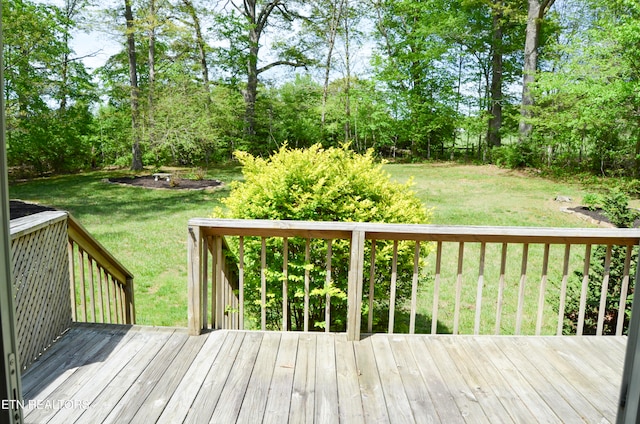 deck featuring a lawn