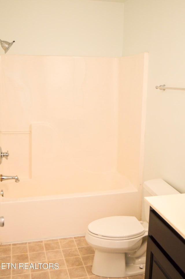 full bathroom featuring shower / bathing tub combination, vanity, and toilet