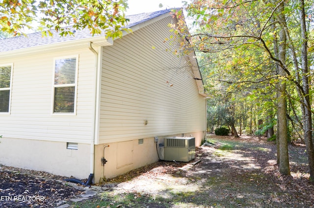 view of home's exterior with central AC