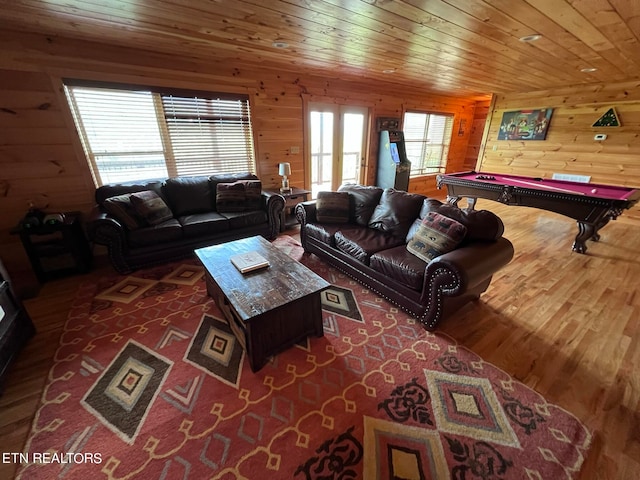 living room with wooden ceiling, pool table, dark wood-type flooring, and wooden walls