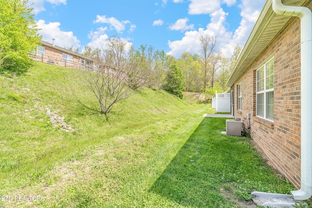 view of yard featuring central AC
