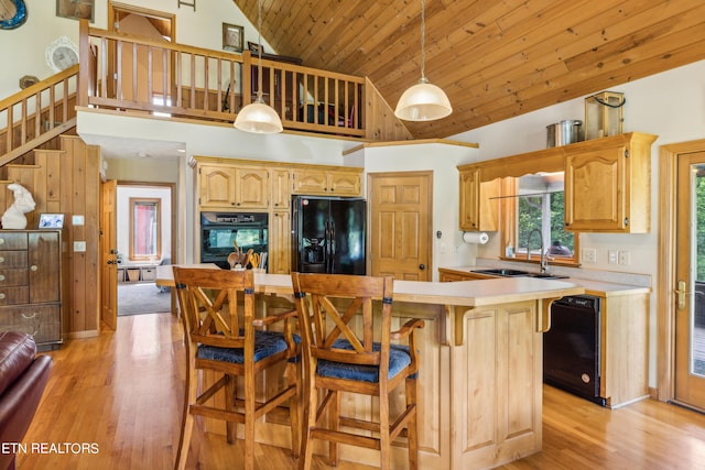 kitchen featuring light wood-type flooring, black appliances, wood ceiling, high vaulted ceiling, and sink