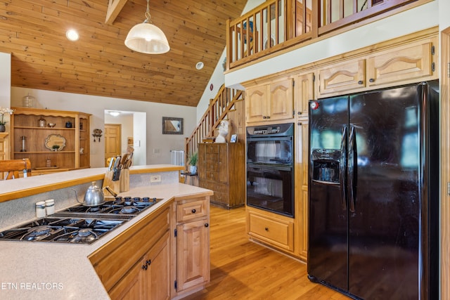 kitchen featuring light wood-type flooring, black appliances, decorative light fixtures, high vaulted ceiling, and wood ceiling