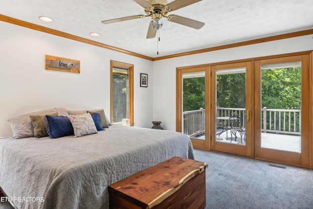 carpeted bedroom featuring access to outside, a textured ceiling, ornamental molding, and ceiling fan