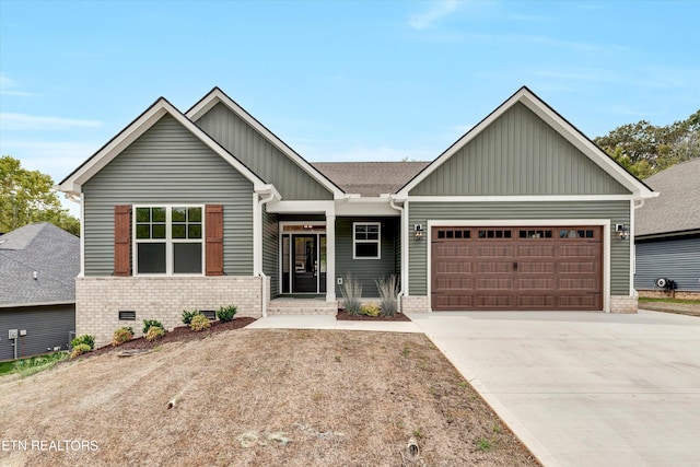 craftsman-style home with a garage