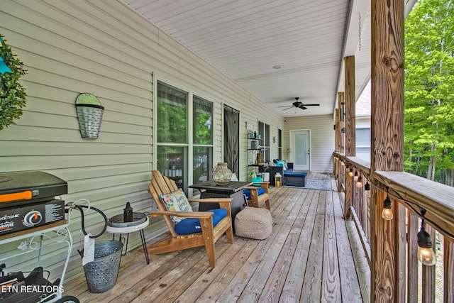 wooden terrace with ceiling fan