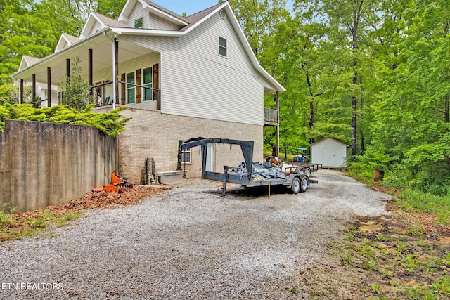 exterior space with a storage shed