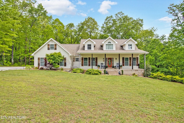 cape cod-style house with a porch and a front lawn