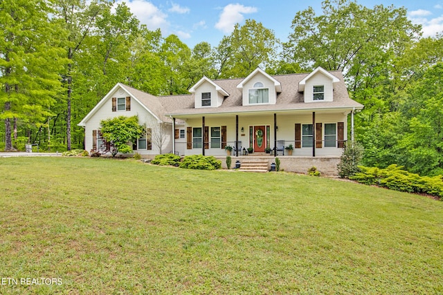 cape cod house featuring a front yard and a porch