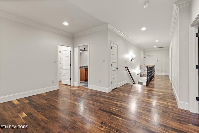 interior space with dark wood-type flooring and ornamental molding