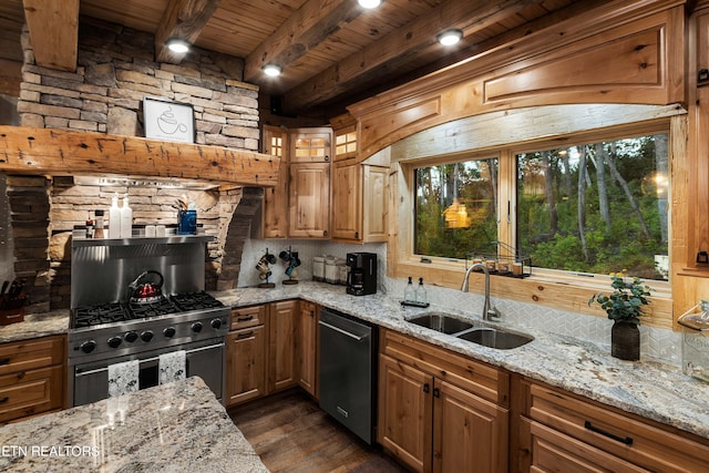kitchen with light stone countertops, wood ceiling, stainless steel appliances, sink, and beam ceiling