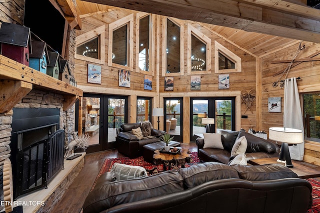 living room featuring wooden ceiling, a fireplace, hardwood / wood-style flooring, and high vaulted ceiling