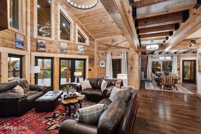 living room featuring wood ceiling, wood walls, dark hardwood / wood-style flooring, french doors, and beamed ceiling