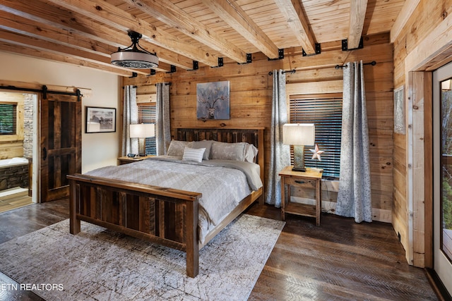 bedroom featuring a barn door, beam ceiling, wooden walls, dark hardwood / wood-style flooring, and wooden ceiling