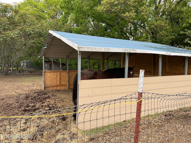 view of stable with an outdoor structure