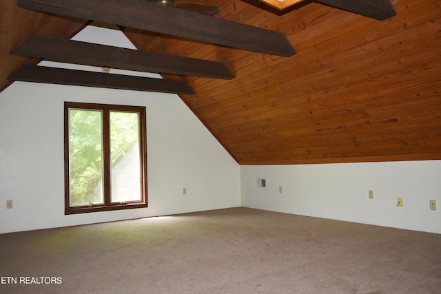 additional living space with wood ceiling, carpet flooring, and vaulted ceiling with beams