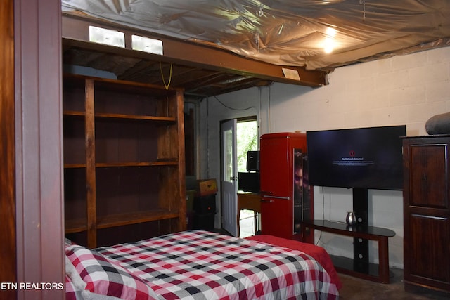 bedroom with concrete floors