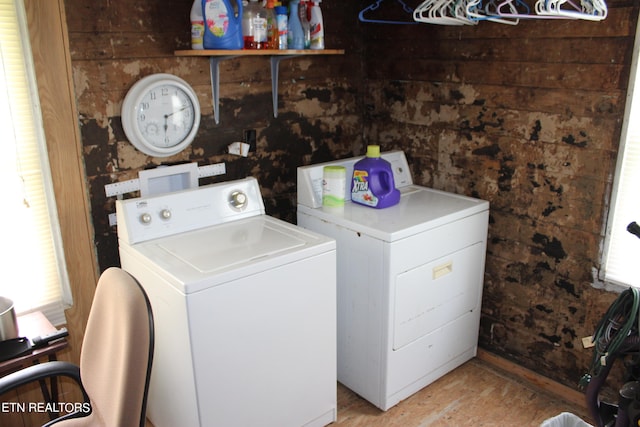 laundry room featuring separate washer and dryer