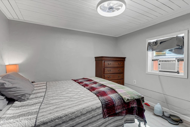 bedroom featuring wood-type flooring