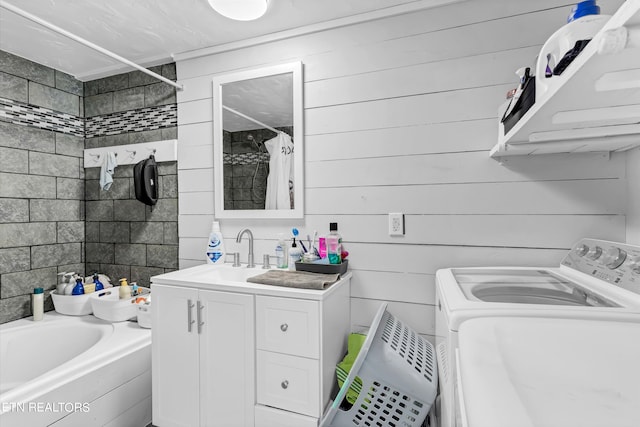 bathroom with independent washer and dryer and large vanity