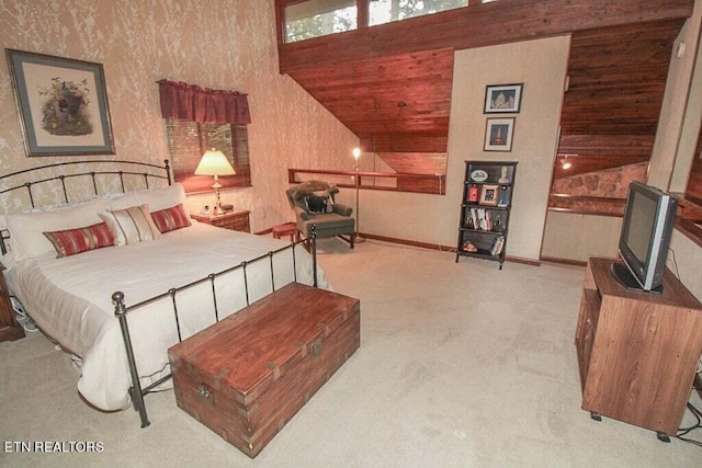 bedroom featuring high vaulted ceiling, wood walls, and light carpet