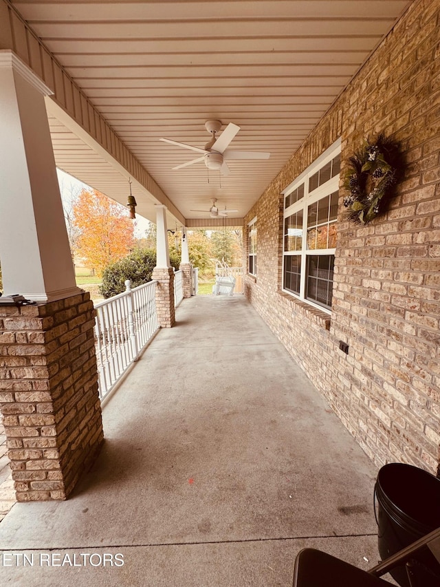 view of patio / terrace with ceiling fan and a porch