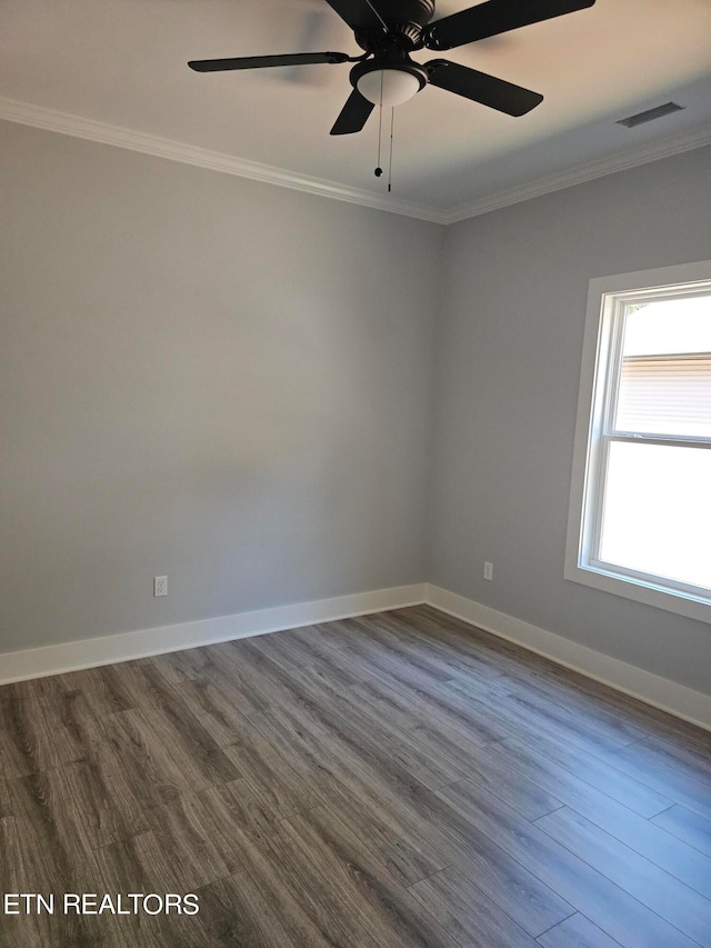 unfurnished room with ceiling fan, crown molding, and hardwood / wood-style floors