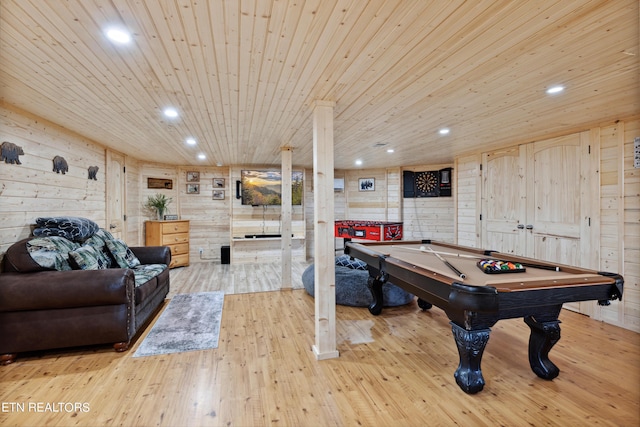 recreation room featuring wood ceiling, wood walls, pool table, and light hardwood / wood-style floors