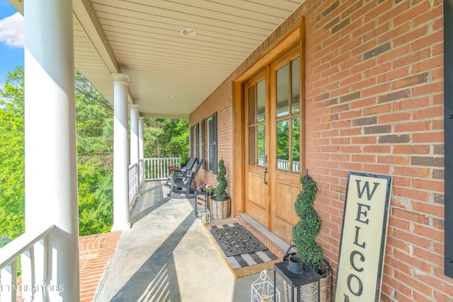 view of terrace featuring covered porch