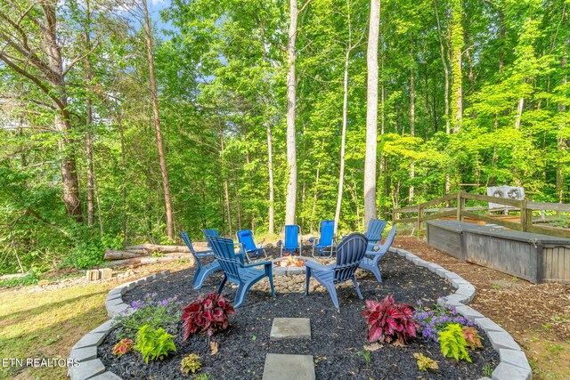 view of patio with a fire pit