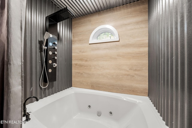 bathroom with wooden walls