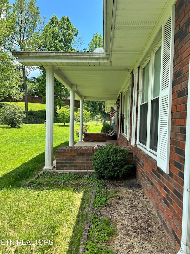 view of yard with a porch