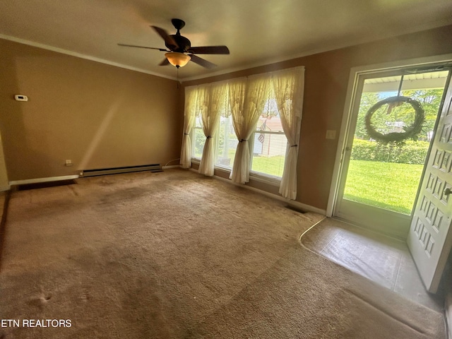 carpeted spare room with ceiling fan and a baseboard heating unit