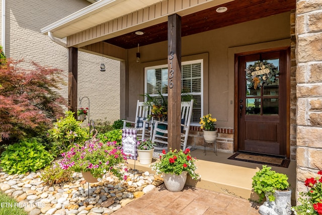 entrance to property with a porch