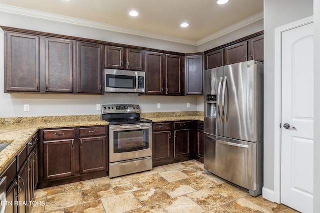 kitchen featuring stainless steel appliances, dark brown cabinets, light stone counters, and ornamental molding