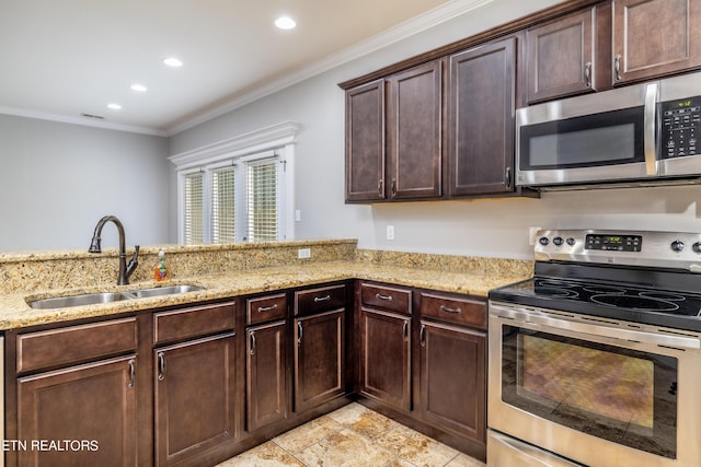 kitchen with stainless steel appliances, crown molding, kitchen peninsula, and sink