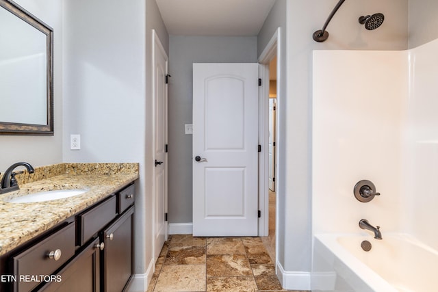 bathroom featuring shower / bath combination and vanity