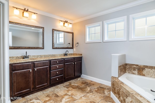 bathroom with a relaxing tiled tub, vanity, and crown molding