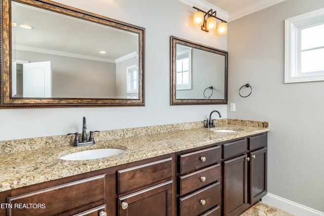 bathroom featuring vanity and ornamental molding